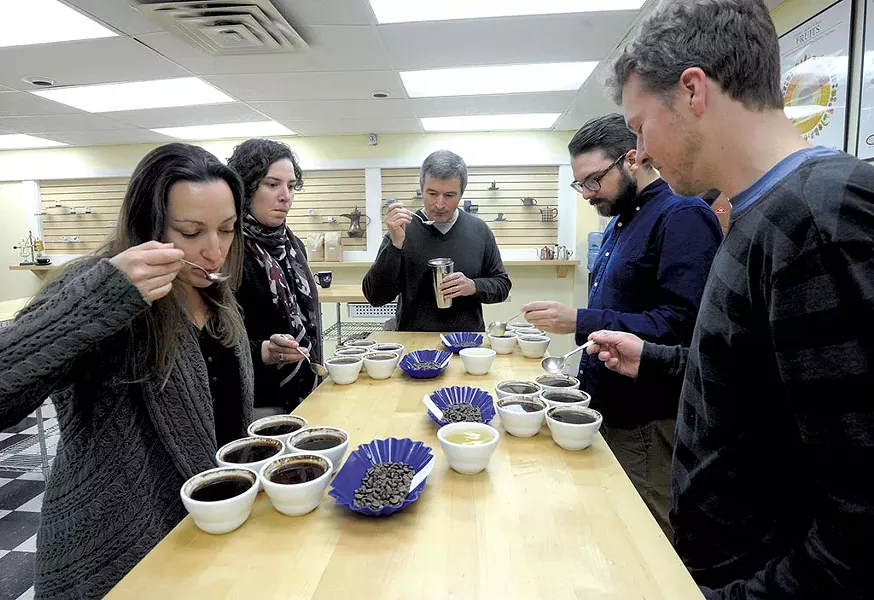 Coffee Lab International staff Shannon Cheney, Debby Pakbaz, Mané Alves, Maxwell Duquette and Josh Parker cupping coffee - JEB WALLACE-BRODEUR