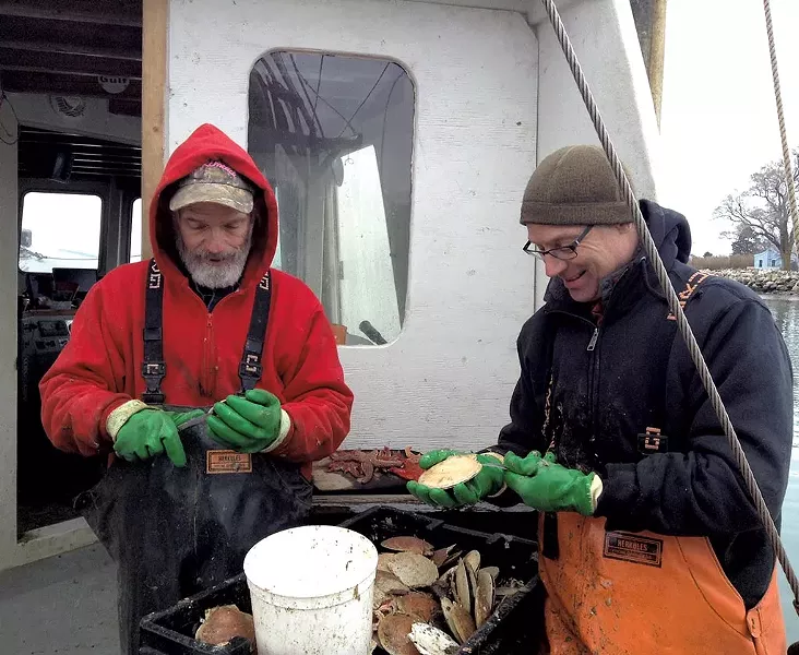 Mike Anderson and Bob Lesnikoski shucking scallops - COURTESY OF BOB LESNIKOSKI
