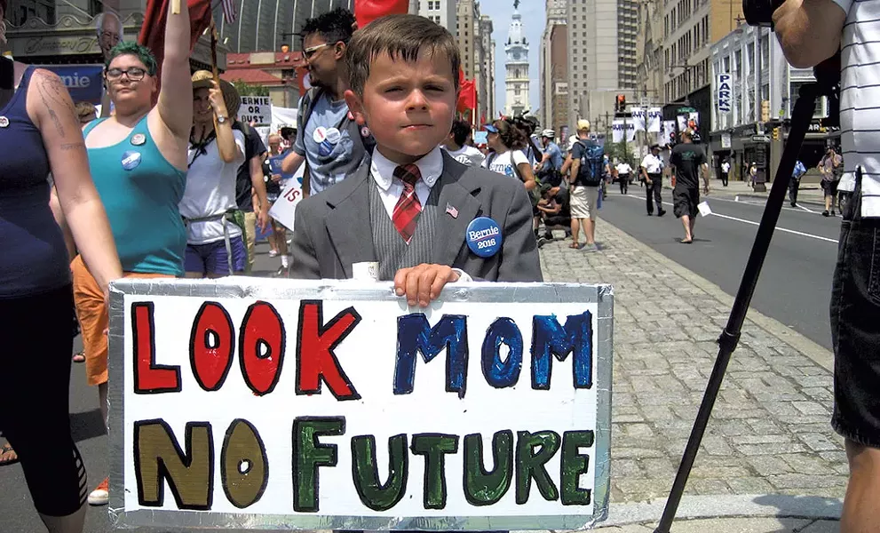 Connor Garrett, 9, of Hamden, Conn., marching in Philly - KEVIN J. KELLEY