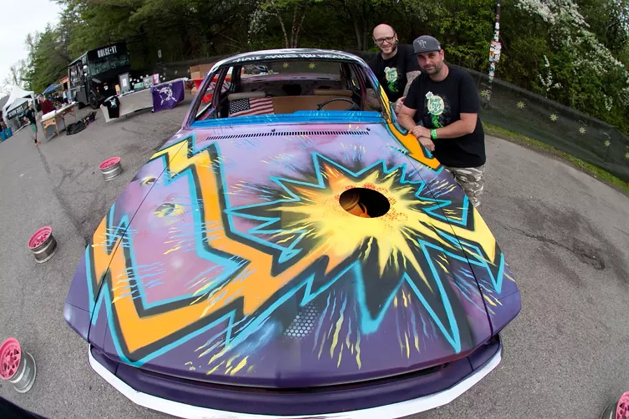 Jason "Tooth" Toothaker and Brian Clark with Big Heavy World's demolition derby car