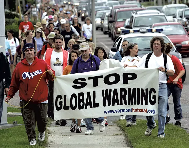 Protesters participating in a walk along Route 7 in South Burlington, September 4, 2006 - ASSOCIATED PRESS / ALDEN PELLETT