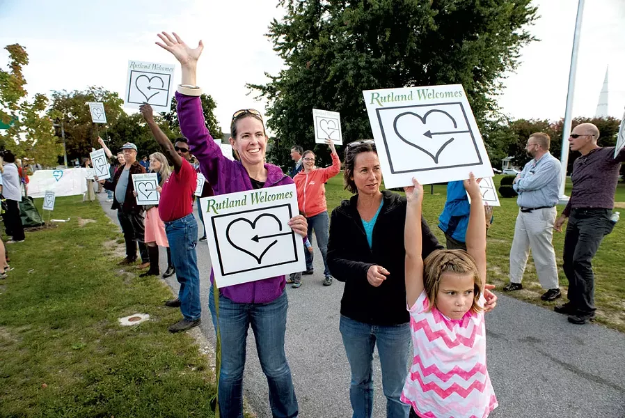Center left to right: Erica Wallstrom, Madison Akin and Bex Akin at the Rutland Welcomes rally - CALEB KENNA