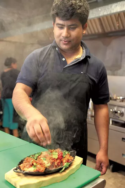 Jeetan Khadka with tandoori chicken - MATTHEW THORSEN