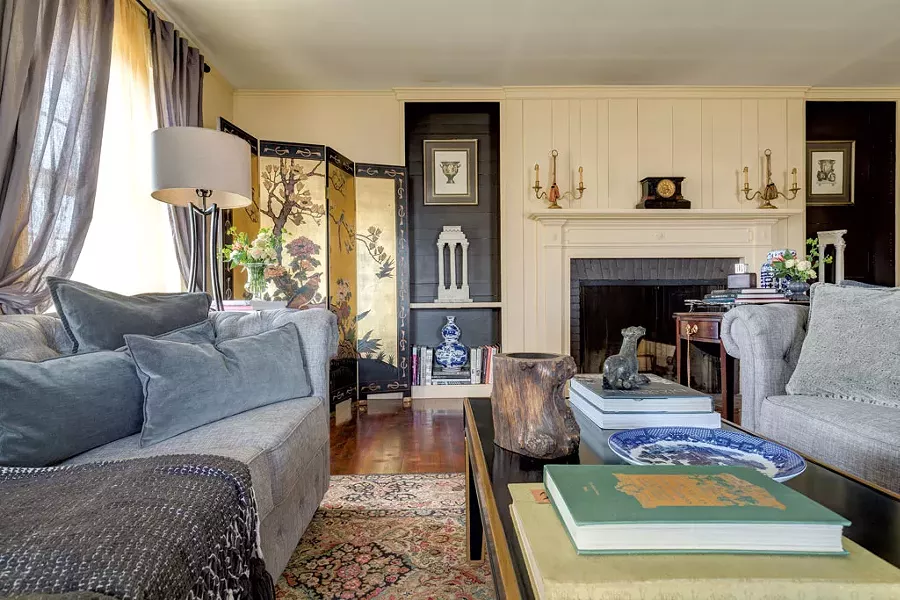 Kory Rogers and Jonathan Mikulak strike a suitably elegant tone in their apartment at Shelburne Farms. - CALEB KENNA