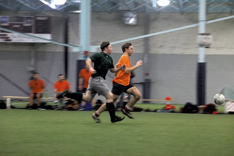 Tim Ashe (front) playing soccer last Thursday in Shelburne - MATTHEW THORSEN
