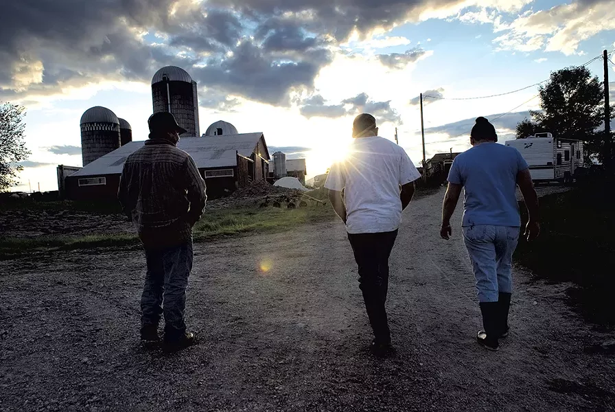 Migrant workers on a Vermont dairy farm - CALEB KENNA/THE GOLDEN CAGE PROJECT/VERMONT FOLKLIFE CENTER