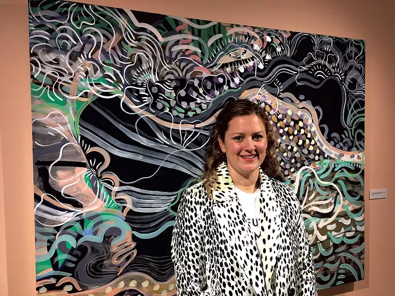 Wylie Sofia Garcia in front of "I Think I Know My Geography Pretty *** Well" - PAMELA POLSTON