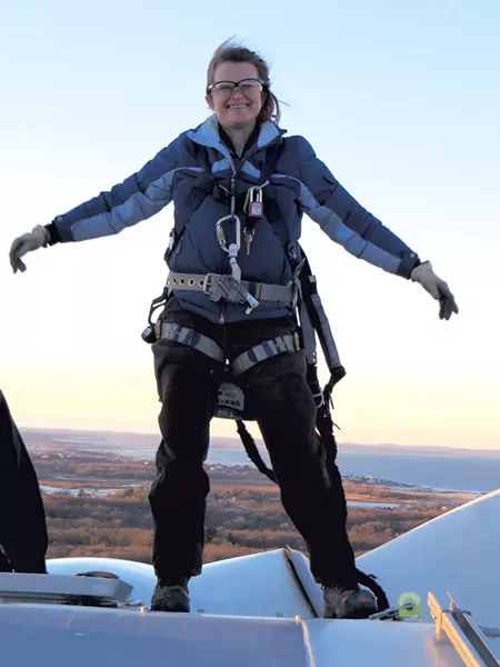 Sally Wright atop a wind turbine - COURTESY OF SALLY WRIGHT