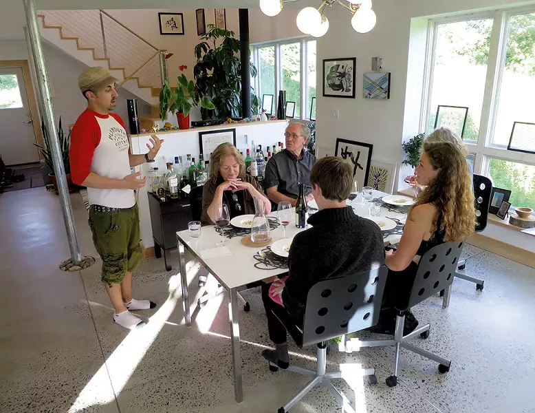 Jesse Lauer talking to the Oren family and Alex Raub - MATTHEW THORSEN