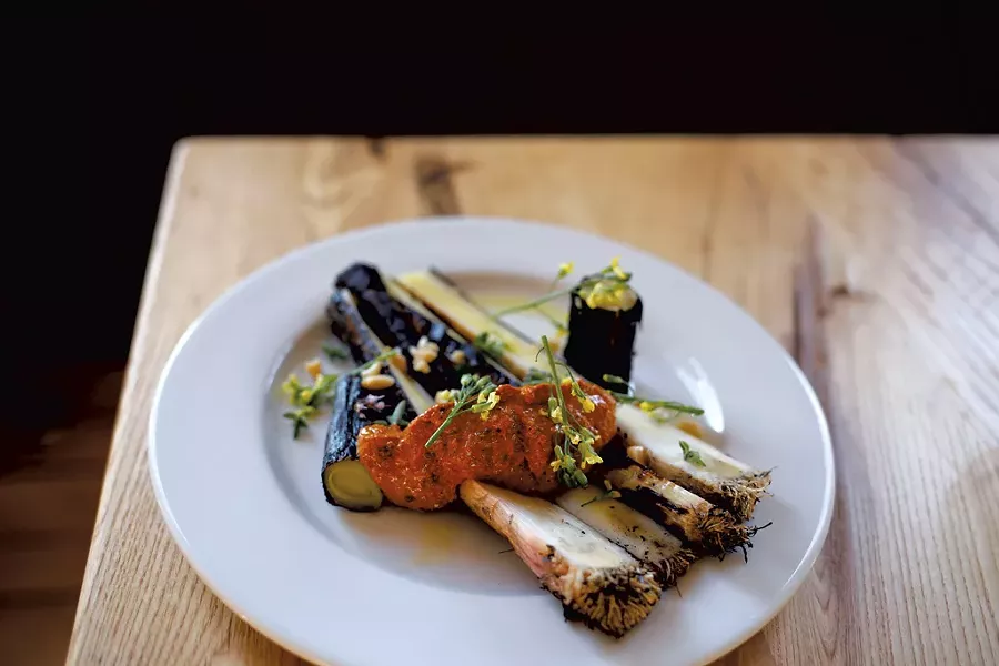 An appetizer of charred sweet leeks - SARAH PRIESTAP