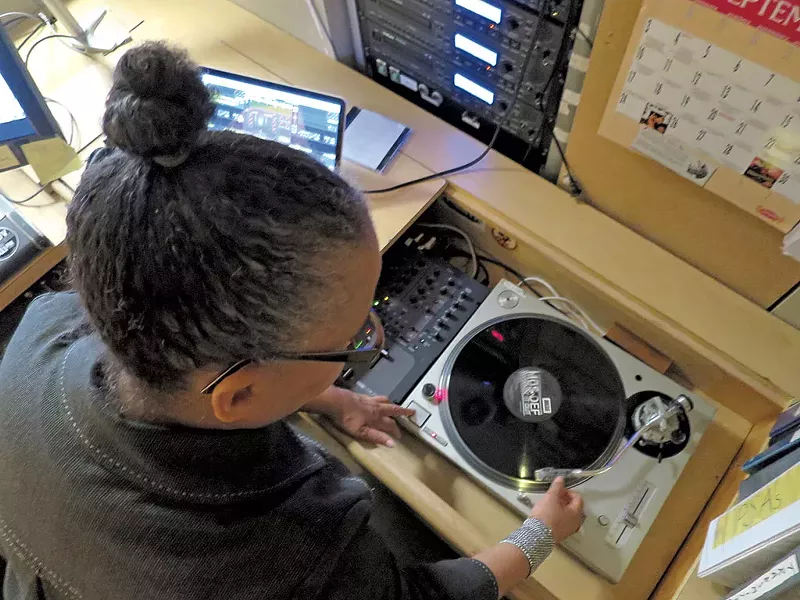 Melo Grant cuing up a record - MATTHEW THORSEN
