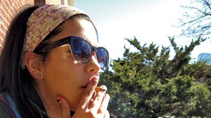 UVM student Haley Agront took a smoke break earlier this year.