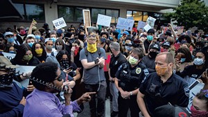 Activists confronting Burlington police chiefs at a May 30 protest