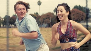 BORN TO RUN Hoffman and Haim have a believably messy friendship in Anderson's engrossing period piece.
