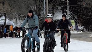 The Garbach family tries out fat bikes at the &Uuml;berwintern festival in Stowe