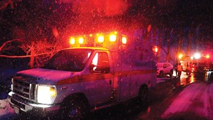 Rescue Inc. paramedics responding to a vehicle that slid off the road in Dummerston