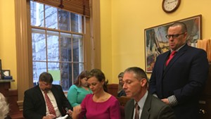 Labor Commissioner Lindsay Kurrle and Commerce Secretary Mike Schirling (seated, head of table)