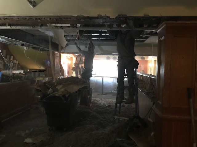 Working on repairs inside El Gato Cantina - COURTESY OF EL GATO CANTINA