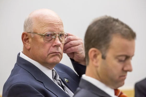 Sen. Norm McAllister (left) listens in court Wednesday with Brooks McArthur, one of his attorneys. - POOL PHOTO/GREGORY J. LAMOUREUX/COUNTY COURIER