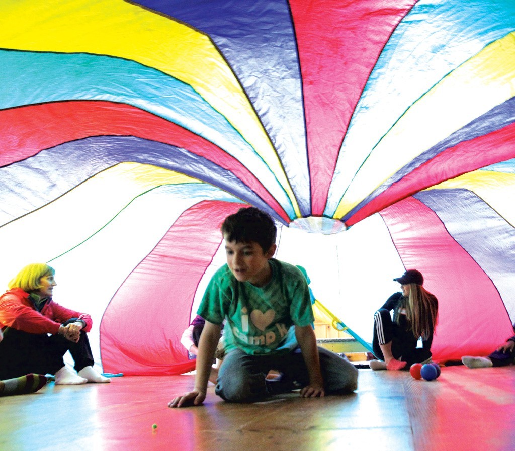Parachute play at Camp Kaleidoscope - MATTHEW THORSEN