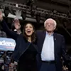 Sen. Bernie Sanders (I-Vt.) and Rep. Alexandria Ocasio-Cortez (D-N.Y.) taking the stage at the Whittemore Center Arena at the University of New Hampshire Sen. Bernie Sanders (I-Vt.) and Rep. Alexandria Ocasio-Cortez (D-N.Y.) taking the stage at the Whittemore Center Arena at the University of New Hampshire