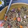 A big bowl of lentils with grilled red onions and cherry tomatoes A big bowl of lentils with grilled red onions and cherry tomatoes