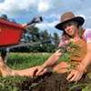 Jahala Dudley with a hemp plant Jahala Dudley with a hemp plant