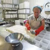 Laini Fondiller of Lazy Lady Farm making goat cheese Laini Fondiller of Lazy Lady Farm making goat cheese