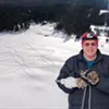 John Predom with one of his snowshoe art creations John Predom with one of his snowshoe art creations