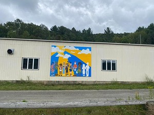 COURTESY OF JOHNSON BEAUTIFICATION COMMITTEE - "Humans of Johnson" mural by Finn Watsula