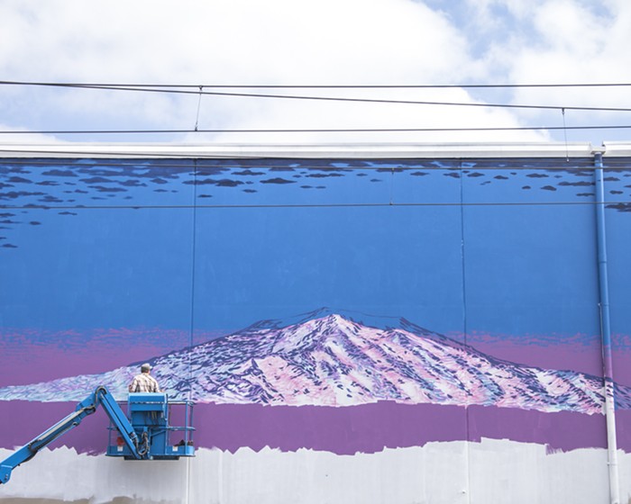SODO Track mural by Casey Weldon of WiseKnave. It helps us all see that mountains are really just paint.