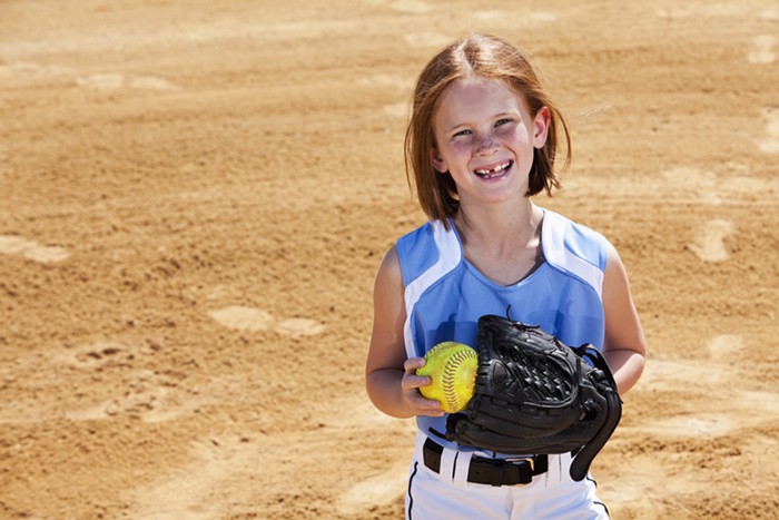 Maybe she just likes baseball; maybe she was Babe Ruth in a past life.