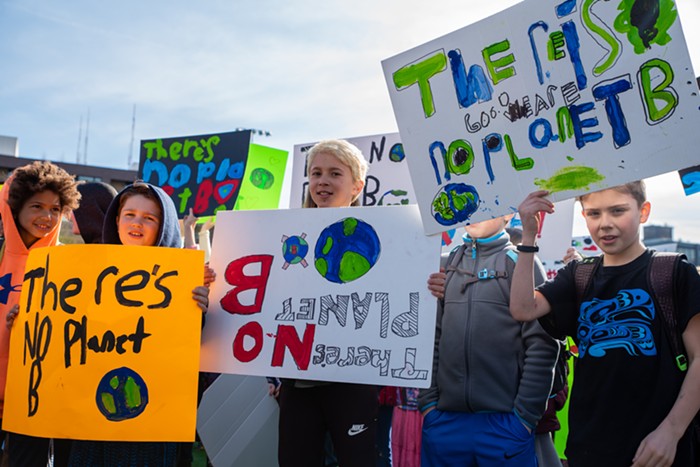 An army of young students hold signs reading Theres no planet B with at least two out of three holding it rightside up. In his defense, this is a chronic problem of striking.