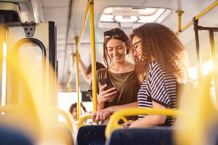 These bitches are way too happy to be super commuters.