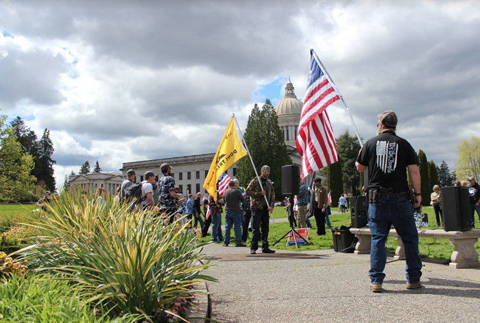 The PA was loud enough to attract attention, but not loud enough that you could hear it from far away, so people gathered more closely over here.