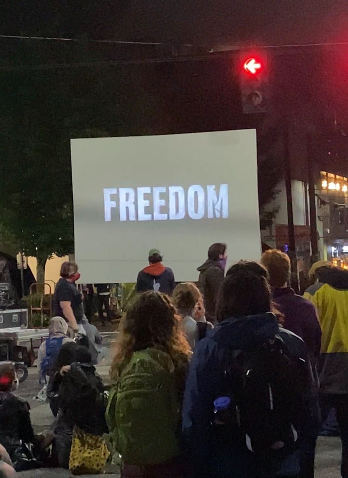 The second day of the Capitol Hill Autonomous Zone ended in a street screening of Ava DuVernays 13th.