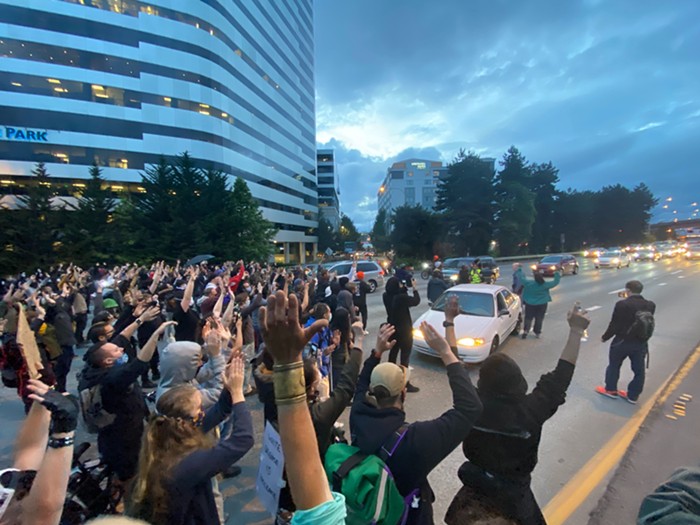 People got out of their cars and joined demonstrators as they blocked traffic on I-5 for five minutes.