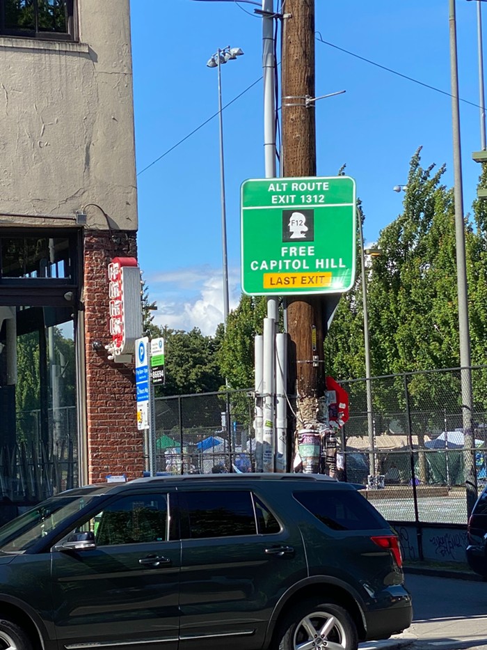 A Free Capitol Hill sign remains at the entrance to CHOP. CHOP is the most dominant name for the area, but signs for CHAZ and Free Capitol Hill remain in the area.