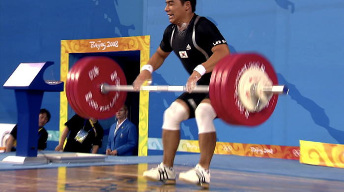 Athens silver medalist Lee Bae-Young, from South Korea, tore his left calf muscle during the mens 69kg weightlifting category at the 2008 Beijing Olympics. Somehow, he decides to do two more attempts after this. It doesnt end well. Athens silver medalist Lee Bae-Young, from South Korea, tore his left calf muscle during the mens 69kg weightlifting category at the 2008 Beijing Olympics. Somehow, he decides to do two more attempts after this. It doesnt end well.