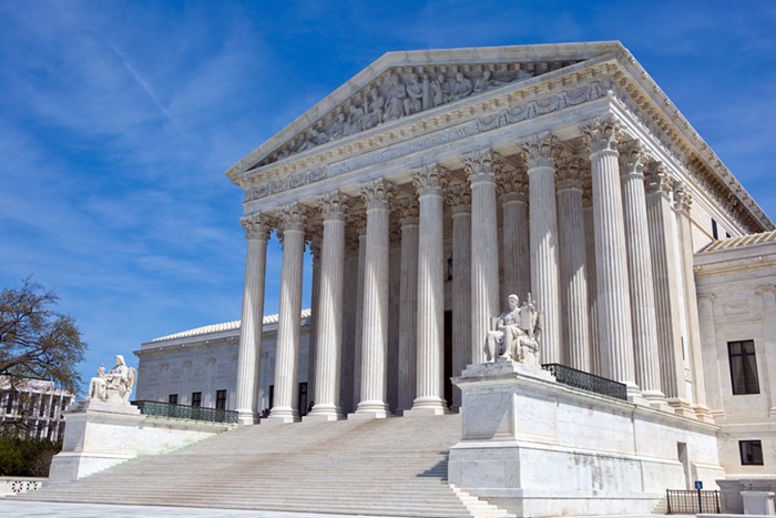 Its a little hard to read, but those words chiseled over the door say Equal Justice Under Law Its a little hard to read, but those words chiseled over the door say Equal Justice Under Law