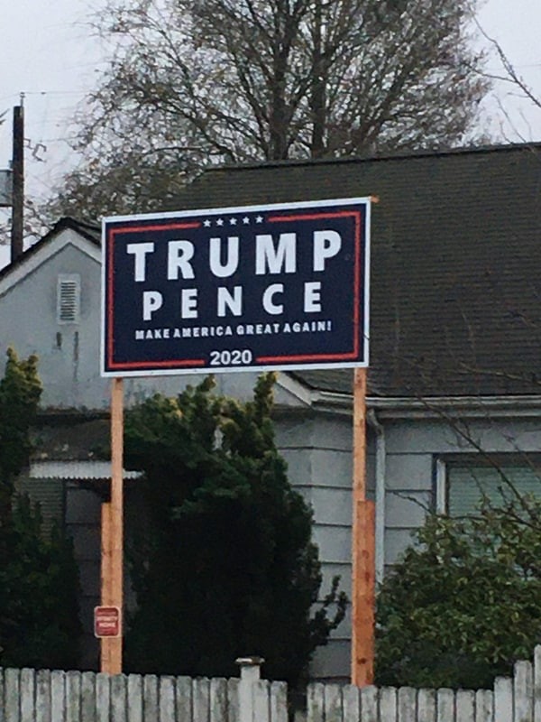 After someone vandalized the Trump sign in Kevin Chambers yard, he built it up higher.