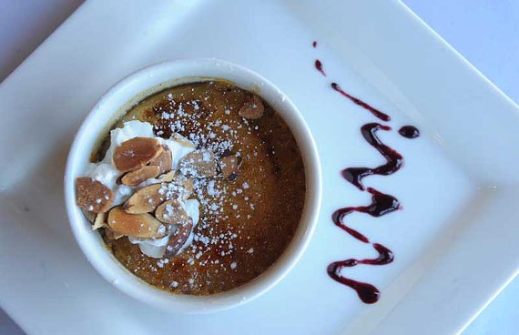 Amaretto pumpkin crème brûlée is one of a series of knock-out desserts at Hermitage Grill in Lakeside. - SCOTT ELMQUIST