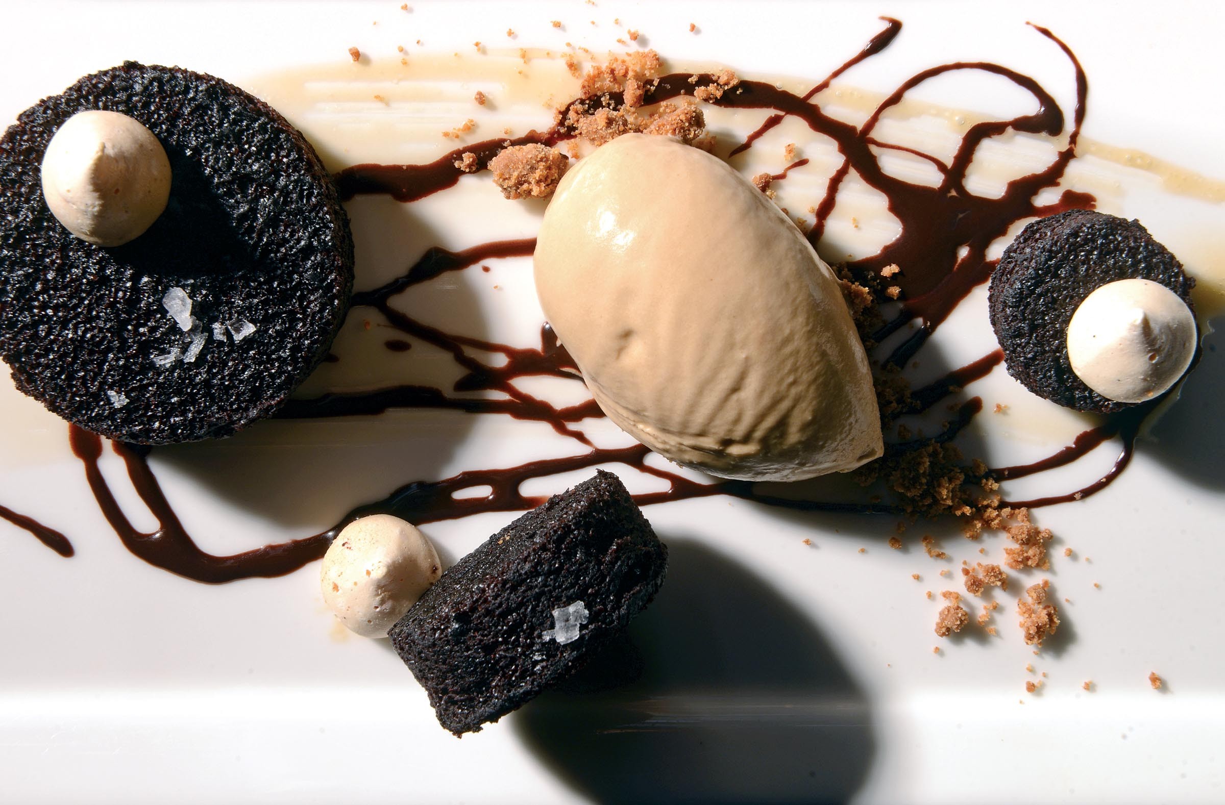Chocolate cake at Patina is a work of art with salted caramel ice cream and meringue drizzled with chocolate. The Short Pump restaurant has a new owner, chef and menu. - SCOTT ELMQUIST