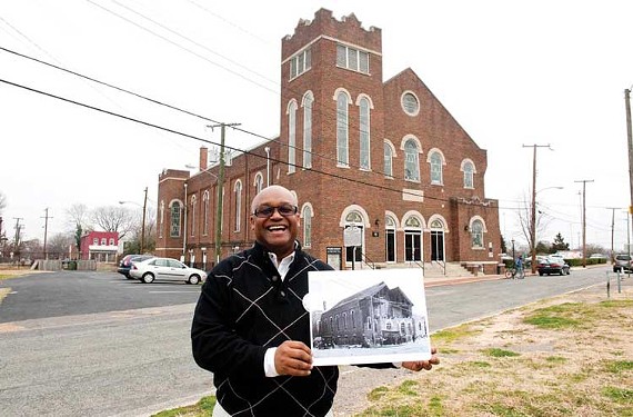 Church historian Benjamin Ross holds a photograph of the 1926 renovation of Sixth Mount Zion. Thirty-one years later, Interstate 95 came roaring past the historic building. - SCOTT ELMQUIST