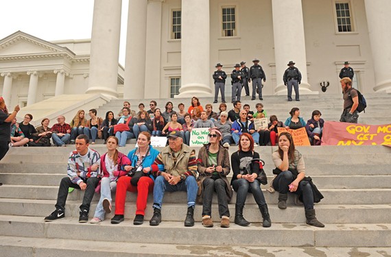 Thirty protesters refused to leave the steps of the Capitol and were arrested and detained for hours March 3. The incident, some political observers say, re-energized the base of the Democratic Party, and helped Obama get re-elected. - SCOTT ELMQUIST