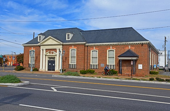 The former SunTrust branch bank on West Broad Street at Summit Avenue in Scott’s Addition elegantly combines elements from architect Sir Christopher Wren and the colonial revival movement. The 1949 bank, a contributing building to the Scott’s Addition Historic District, is an outlier, architecturally, to the stark modernism of most of the buildings in the neighborhood. It is slated for demolition to make way for the Summit, a 166-unit apartment complex of little architectural merit. - SCOTT ELMQUIST