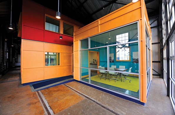 For the offices of Dovetail Construction Co. on Brook Road, new energy-efficient office spaces were set within a historic trolley-car barn. - SCOTT ELMQUIST