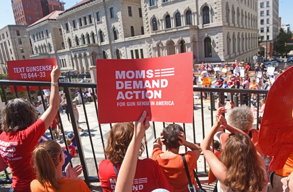 Members of Moms Demand Action protest gun violence on Tuesday, July 9, the day of the special session on new gun legislation that Republicans pushed until after the November election. - SCOTT ELMQUIST