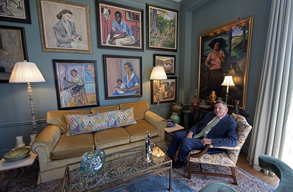 Keith Kissee, a collector of American and European art from the first half of the 20th century, sits beneath works by Virginia-born artist Harriet Fitzgerald (1904-1984) displayed on the east wall of his living room. Danville native Fitzgerald, who studied with John Sloan at the Art Student’s League in New York, often painted the everyday people and scenes of her hometown. A work by California WPA artist Otis Oldfield, “La Bohemian,” hangs on the adjacent wall. - SCOTT ELMQUIST