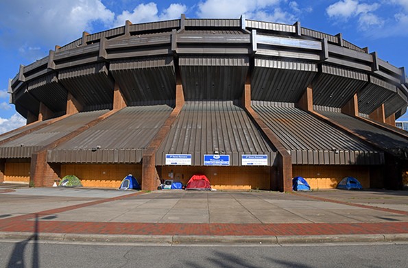 A homeless encampment sits outside of the Richmond Coliseum. - SCOTT ELMQUIST
